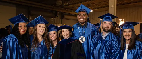 TCC Graduates Pose with TCC President, Dr. Leigh B. Goodson 